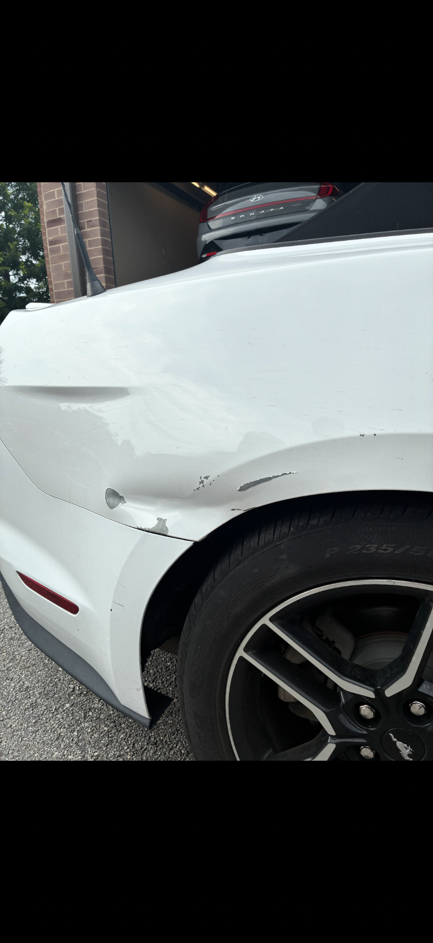 Rear Quarter Panel Repair before repair at Roland Auto Collision Repair in Duluth, GA