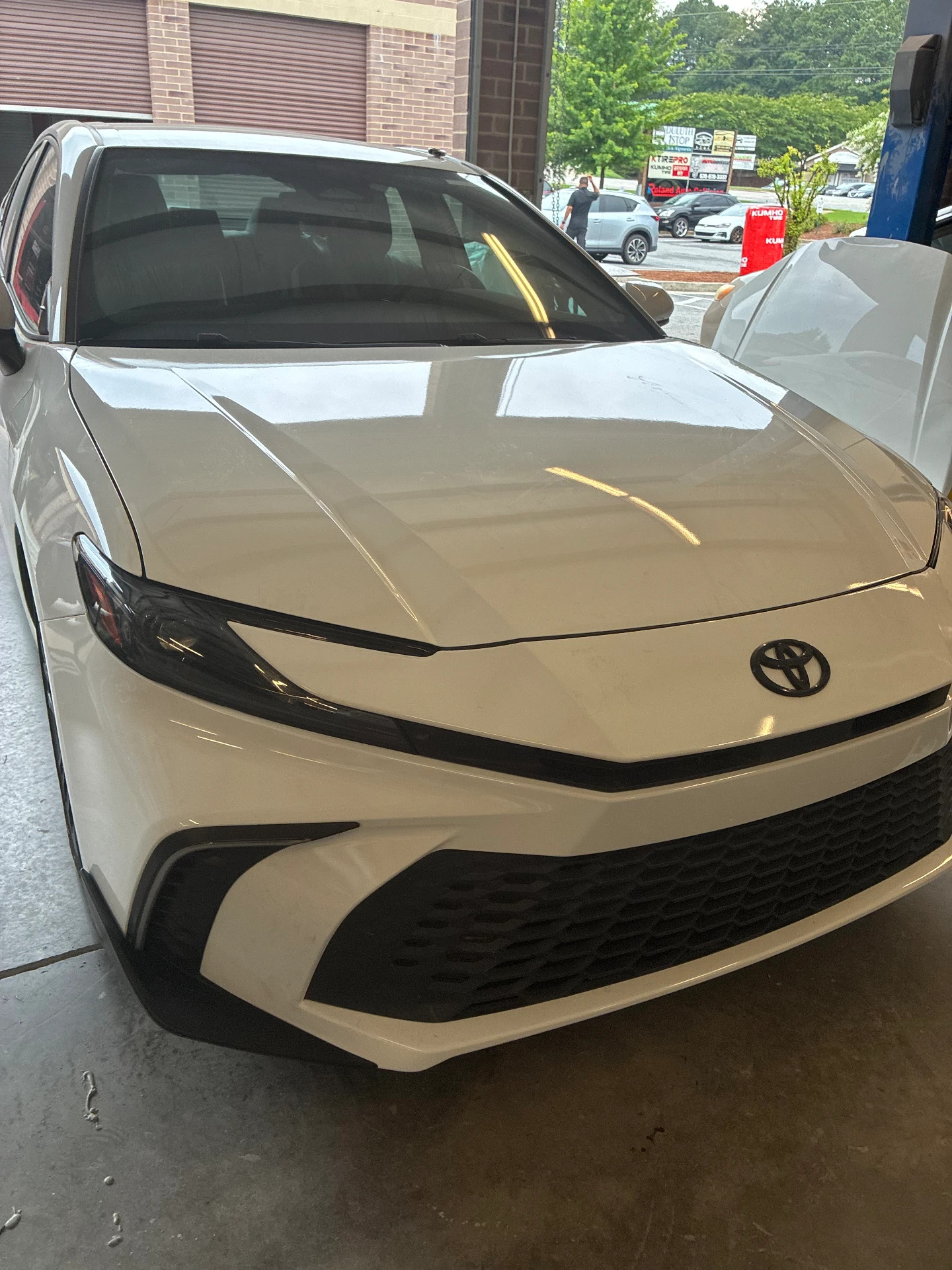 Toyota Camry Front Bumper & Headlight Repair after repair at Roland Auto Collision Repair in Duluth, GA