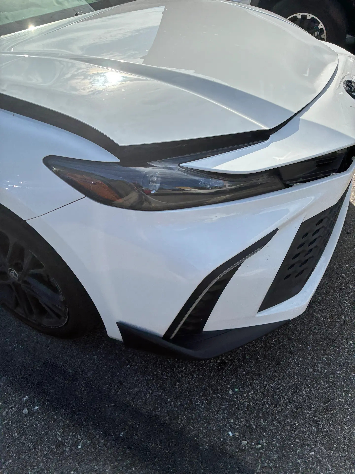 Toyota Camry Front Bumper & Headlight Repair before repair at Roland Auto Collision Repair in Duluth, GA