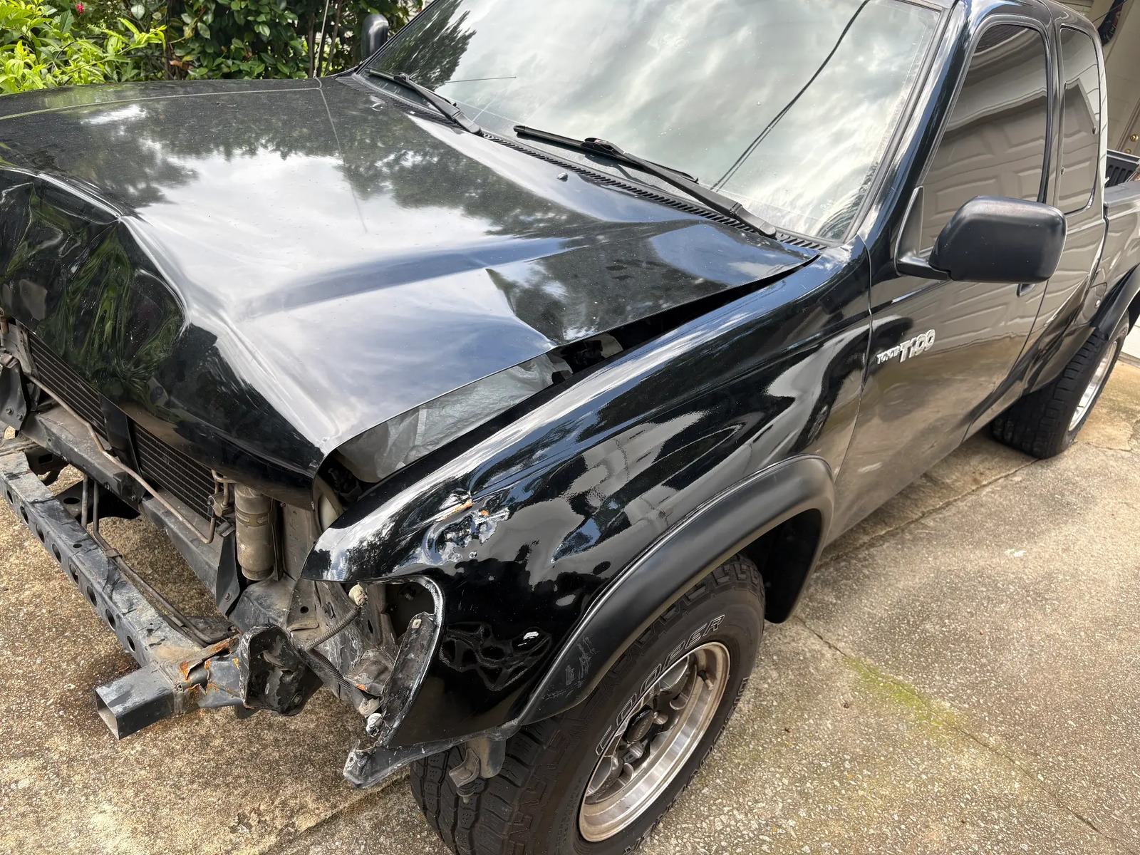 Toyota T100 Front End Damage & Frame Work before repair at Roland Auto Collision Repair in Duluth, GA