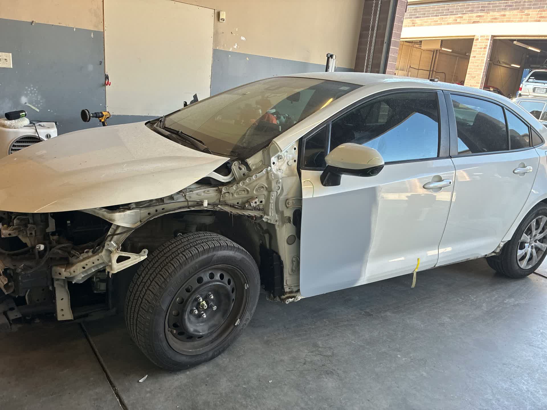 Toyota Corolla Front Left Side Repair before repair at Roland Auto Collision Repair in Duluth, GA